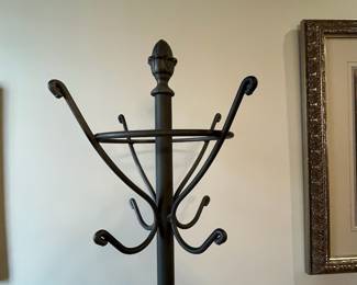 R109 - $100. Heavy duty Iron Coat Rack. Measures 22" wide x 72" tall. 