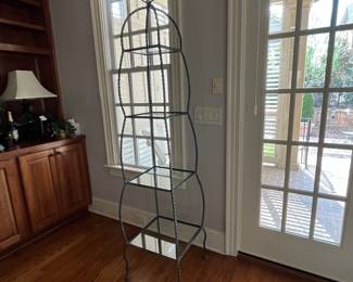 R93 - $250. Regency Twisted Metal Rope Iron & Glass Etagere. Measures 18" square x 79" tall. 