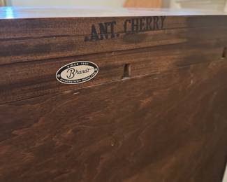 R12 - $40. Brandt Cabinet. Antique Cherry Finish. Measures 33" x 13" x 29" tall. 