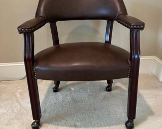 R103 - $65. Steve Silver Furniture - Rolling Captains Chair.  Measures 25.5" x 18" x 29.5" tall. Very gently used in excellent condition. 