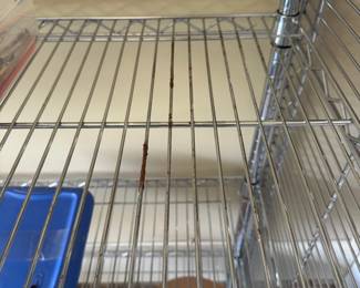 R39 - $75. Metal Garage Storage/Shelving. Measures 48" x 18" x 72" tall. One shelf has rust - others are all in good shape!