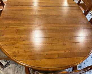 R114 - $450. Ethan Allen Table & Chairs. Measures 56" round x 30" tall. Has 1 leaf that adds 20". Table is very sturdy and in very good condition. Chairs have been heavily used and need reupholstered / tightened up. 