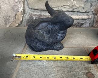 R117 - $15. Hen Feathers Resin Bunny Sculpture. 