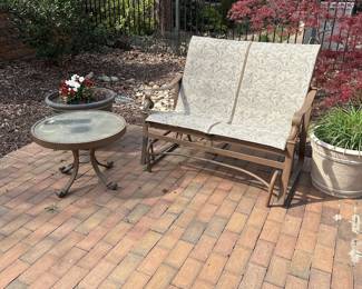 R45 - $450. Set includes 2 arm chairs, 1 glider & 2 side tables. Winston Furniture Brand. They have been stored outside but are not weathered looking!