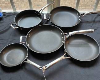 R90 - $45. Set of 5 Calphalon Pans. Williams Sonoma.  No lids.