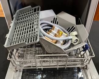 R119 - $125. Farberware Countertop Dishwasher. Model FDW05AS8WHA. A 6-place setting portable countertop dishwasher designed for small kitchens, apartments, dorms, RVs, and boats. 