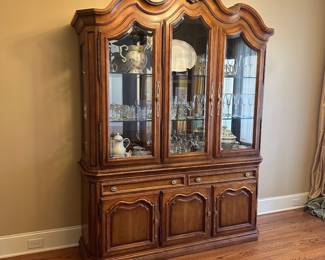 R2 - $950. Henredon Lighted Breakfront China Cabinet. Measures 70" wide x 20" deep x 92" tall. Moves in 2 pieces. 