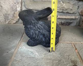 R117 - $15. Hen Feathers Resin Bunny Sculpture. 