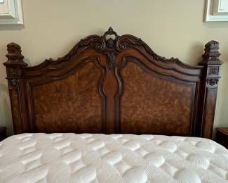 R98 - $750. King Size Bed Frame (maybe Ethan Allen) Measures 87" wide x 94" long x 72" tall. Includes mattress & boxspring if you'd like them! Wear on the footboard knobs. 