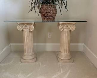 R7 - $45. Glass Top Table with Plaster Columns. Measures 44" x 24" x 29" tall. Minor chipping on plaster - glass is in great condition!