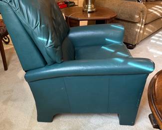 R29 - $50. Green Leather Push Back Recliner. Measures 33" wide x 37" tall. Leather is in very good condition. Chair is a bit wiggly but overall good condition with lots of life left!