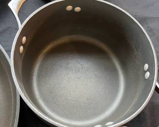 R91 - $50. Set of Calphalon Unison Pot and Pan Set. 2qt and 5qt Pots w/lids. 10" Pan w/lid. 14" Pan No lid.