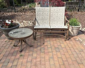 R45 - $450. Set includes 2 arm chairs, 1 glider & 2 side tables. Winston Furniture Brand. They have been stored outside but are not weathered looking!