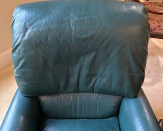R29 - $50. Green Leather Push Back Recliner. Measures 33" wide x 37" tall. Leather is in very good condition. Chair is a bit wiggly but overall good condition with lots of life left!