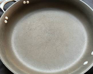 R91 - $50. Set of Calphalon Unison Pot and Pan Set. 2qt and 5qt Pots w/lids. 10" Pan w/lid. 14" Pan No lid.