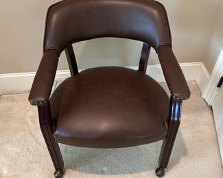 R103 - $65. Steve Silver Furniture - Rolling Captains Chair.  Measures 25.5" x 18" x 29.5" tall. Very gently used in excellent condition. 