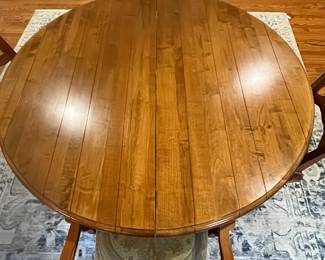 R114 - $450. Ethan Allen Table & Chairs. Measures 56" round x 30" tall. Has 1 leaf that adds 20". Table is very sturdy and in very good condition. Chairs have been heavily used and need reupholstered / tightened up. 