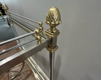 R82 - $450. French Bar Cart. Brass & Glass with finials. Rolls easily! Measures 36" x 20" x 33" tall. 