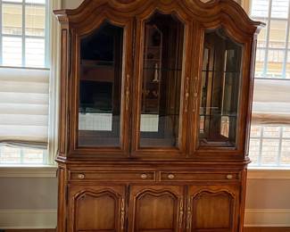 R2 - $950. Henredon Lighted Breakfront China Cabinet. Measures 70" wide x 20" deep x 92" tall. Moves in 2 pieces. 