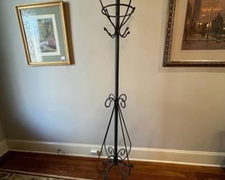 R109 - $100. Heavy duty Iron Coat Rack. Measures 22" wide x 72" tall. 
