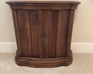 R12 - $40. Brandt Cabinet. Antique Cherry Finish. Measures 33" x 13" x 29" tall. 