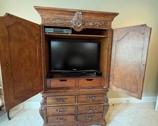 R113 - $550. Chateau Provence by Thomasville Armoire. Measures 49.5" wide x 23" deep x 84" tall. 