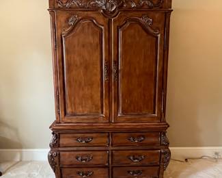 R113 - $550. Chateau Provence by Thomasville Armoire. Measures 49.5" wide x 23" deep x 84" tall. 