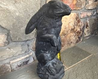 R118 - $25. Hen Feathers Resin Standing Bunny Sculpture. 