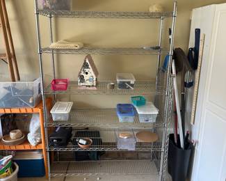 R39 - $75. Metal Garage Storage/Shelving. Measures 48" x 18" x 72" tall. One shelf has rust - others are all in good shape!