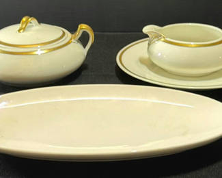 Lot 413: Franciscan White porcelain tea service and dinnerware with gold trim