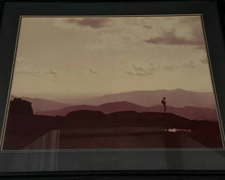 Lot 313: Framed landscape photograph with lone figure