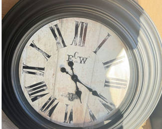 Lot 23: ECW Large Brown Wood-Tone Wall Clock, 18–24 in