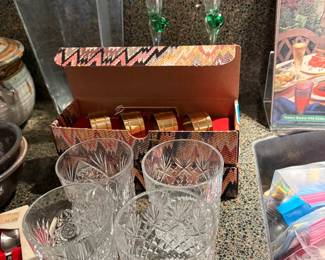 Murano flutes/ crystal glassware/ brass napkin rings