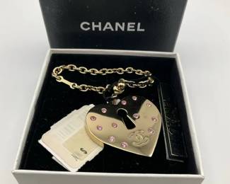 Vintage Chanel 2002 Gold Tone Heart Lock Charm Bracelet with Pink Rhinestones