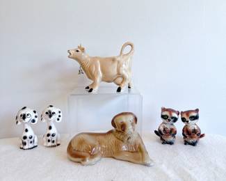 ceramic cow creamer pitcher with bell, pair of Dalmatian salt and pepper shakers, pair of raccoon salt and pepper shakers
