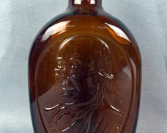 Log Cabin Syrup Amber Bottles, Qty 4, The Bottles Feature The Liberty Bell, Mount Rushmore, Benjamin Franklin, And Indian Head, Each Is Approx 8" Tall 