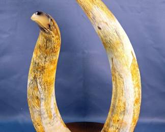 Carved Horns With Eagle Head Tips And Engraved Feather Design, Mounted On Wood 
