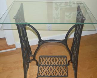 Treadle sewing table with glass top