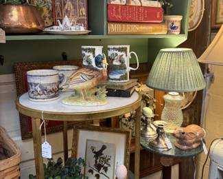 plant side or side table, cut glass lamp with green shade, duck figurine, copper container, mugs