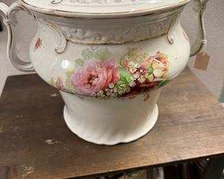 chamber pot featuring decorative floral pattern