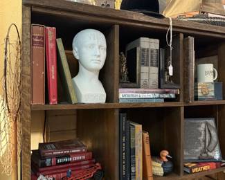 vintage books, sailboat, Phrenology head, duck figurine