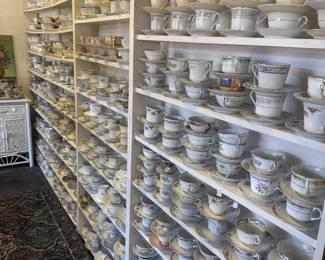 lots of pretty tea cups and saucers