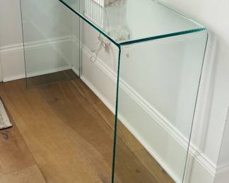 Glass waterfall console table