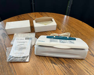 Lot 56: Seal-A-Meal Vacuum Sealer 