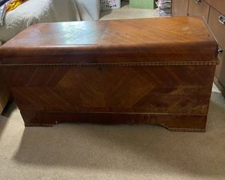 D26 - $75. Lane Cedar Hope chest. Measures 47” wide x 19” deep x 22.5” tall.