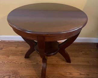 D8 - $125. Pair of Haverty’s end tables. Sturdy and solid. Measures 28” diameter x 24” tall. 