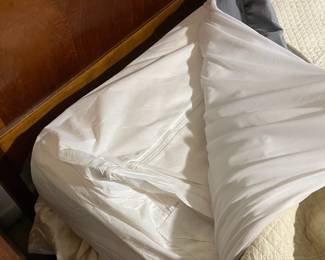 D25 - $400. Stanley bedroom set. Queen size bed, side table, tall, dresser, short dresser with two wall hanging mirrors. Bedside table measures 25” wide x 16” deep x 21.75” tall. Top is worn. Veneer chipped on the bottom.  Tall dresser measures 36” wide x 18.5” deep x 54” tall. Four drawers and three cubbies. Wear on doors from use.  Queen size headboard 49” tall. Mattress was used with a cover on it. Frame is on wheels. Frame is attached to the headboard. Long dresser measures 74” wide x 18.5” deep x 29.5 inches tall. Nine drawers. Some wear and veneer chipped off. Solid construction. Two mirrors measure 19“ wide x 45“ tall. 