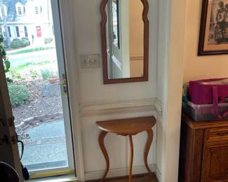 D3 - $60. Half Moon Hall Table and Mirror. Table measures 24”w 12” d 27” t. Mirror measures 16” w 35” t