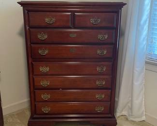 D10 - $150. Solid wood 5-drawer dresser. Measures 36” wide x 18.5” deep x 49” tall. 
