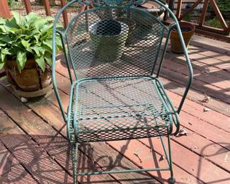 D34 - $150. Patio table and 4 chairs with umbrella stand. Umbrella may need to be replaced. Metal/iron painted green. Solid and sturdy. Table measures 58” wide x 38” deep x 27” tall. 